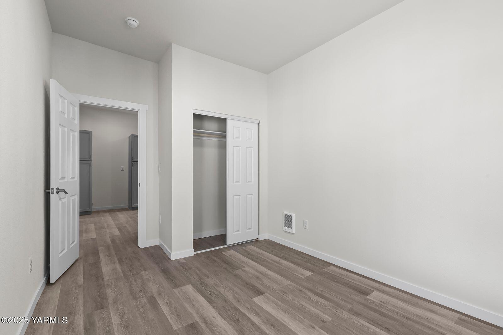 711 North 3rd Street Yakima, WA 98901 - Photo 11 of 21 a view of a room with wooden floor