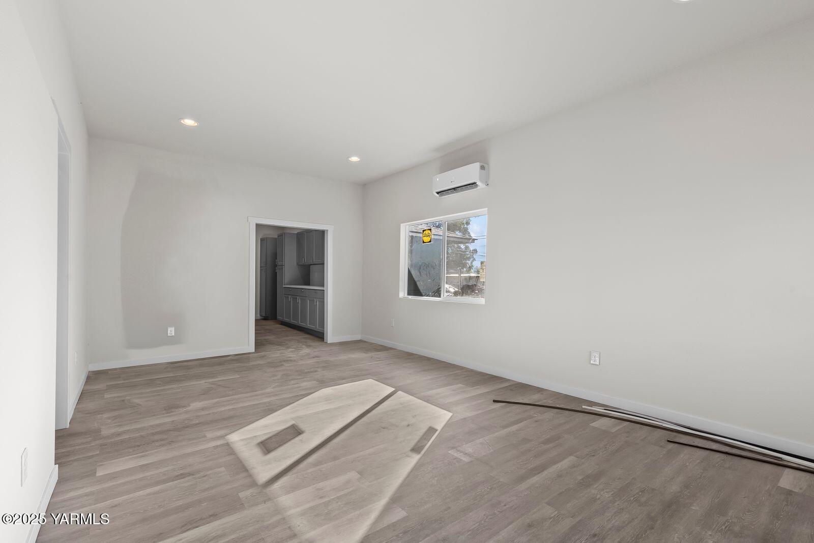 711 North 3rd Street Yakima, WA 98901 - Photo 16 of 21 an empty room with windows