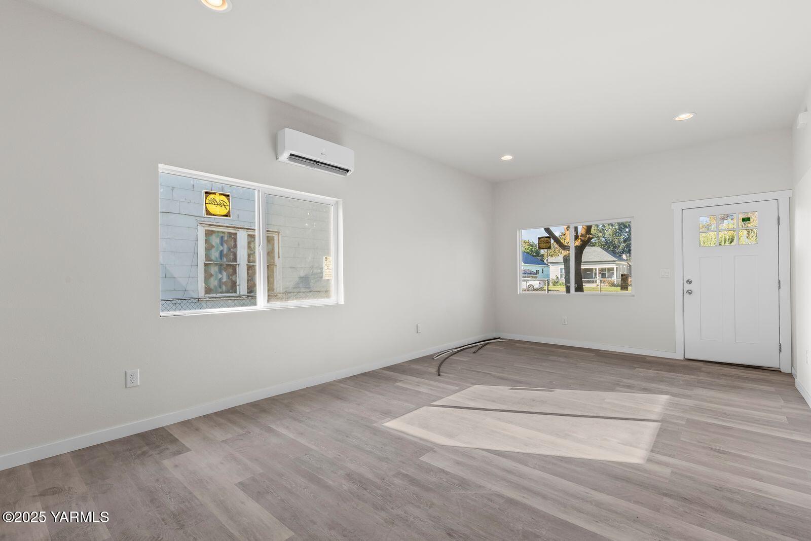 711 North 3rd Street Yakima, WA 98901 - Photo 18 of 21 an empty room with windows