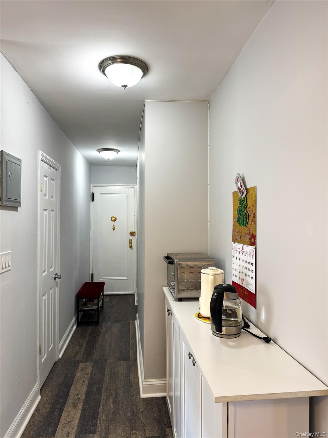 141-12 78th Avenue, Unit 1G Queens, NY 11367 - Photo 6 of 16 a view of a bedroom with bed and wooden floor
