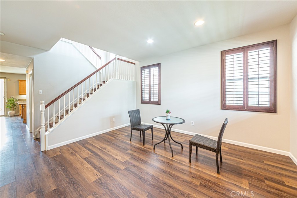 17645 Loganberry Road Carson, CA 90746 - Photo 2 of 56 a view of a livingroom with furniture wooden floor and windows