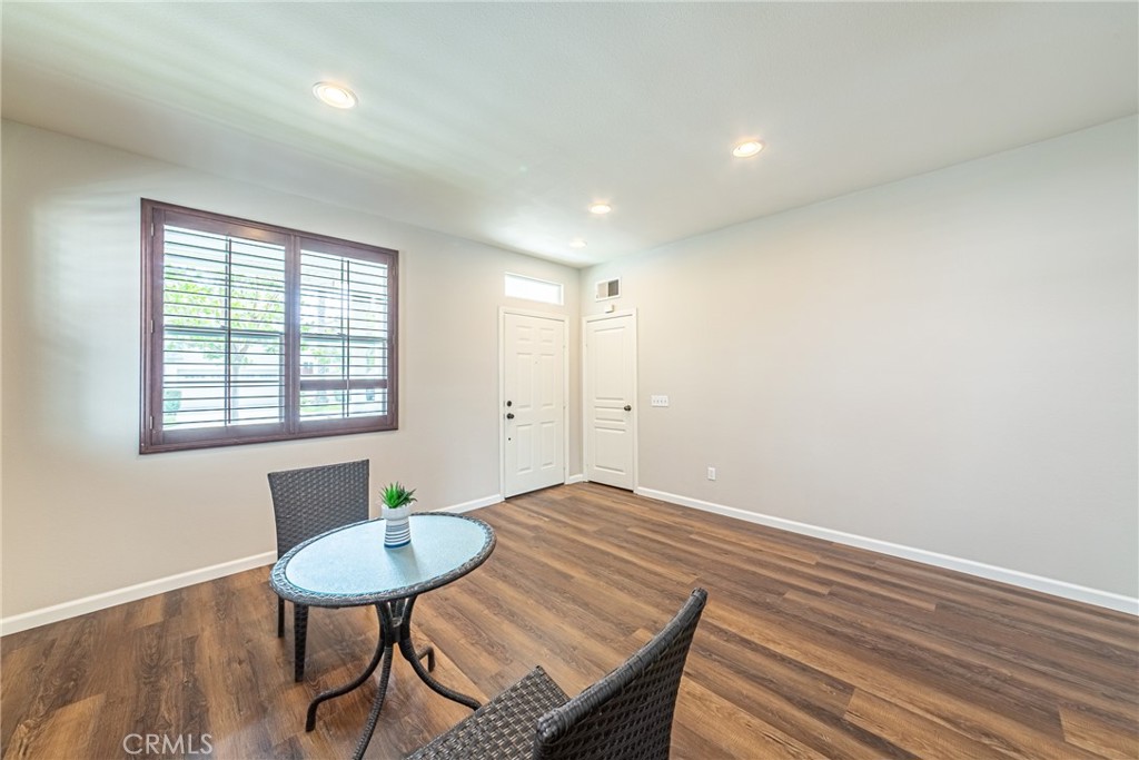 17645 Loganberry Road Carson, CA 90746 - Photo 3 of 56 a view of a room with furniture window and wooden floor