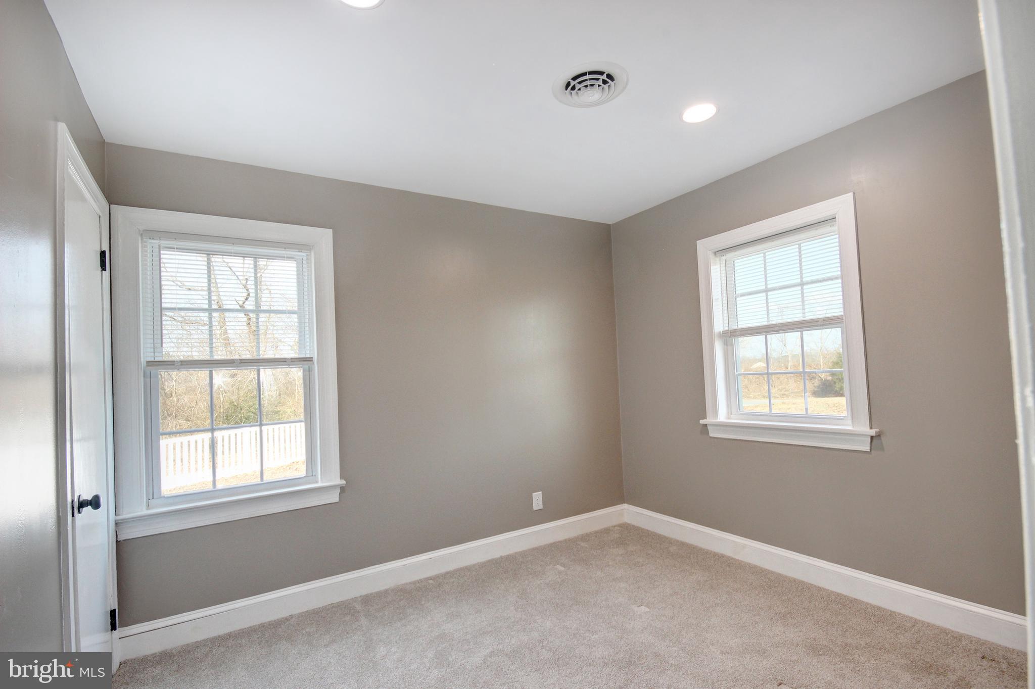 26177 Rewastico Road Hebron, MD 21830 - Photo 18 of 20 an empty room with windows