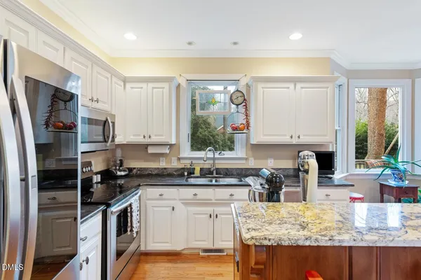 a view of a hallway with windows