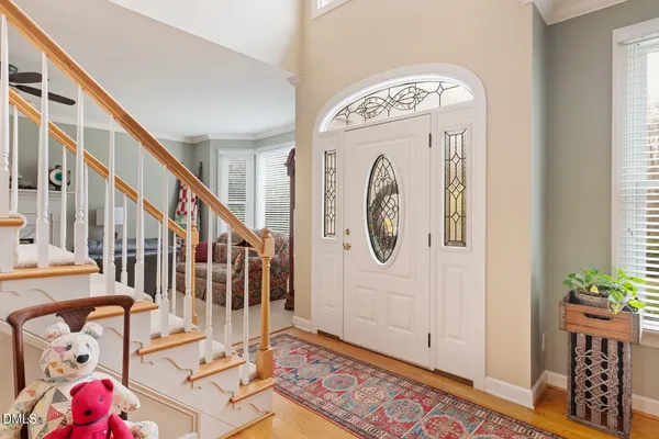 a kitchen with granite countertop a sink stainless steel appliances and cabinets