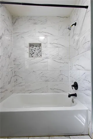 a bathroom with a bathtub