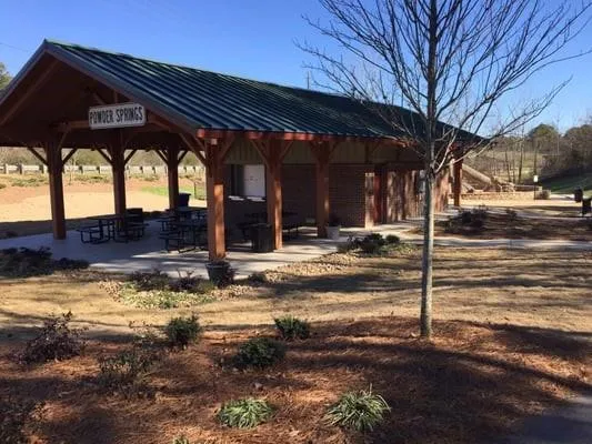 a view of a house with a large tree