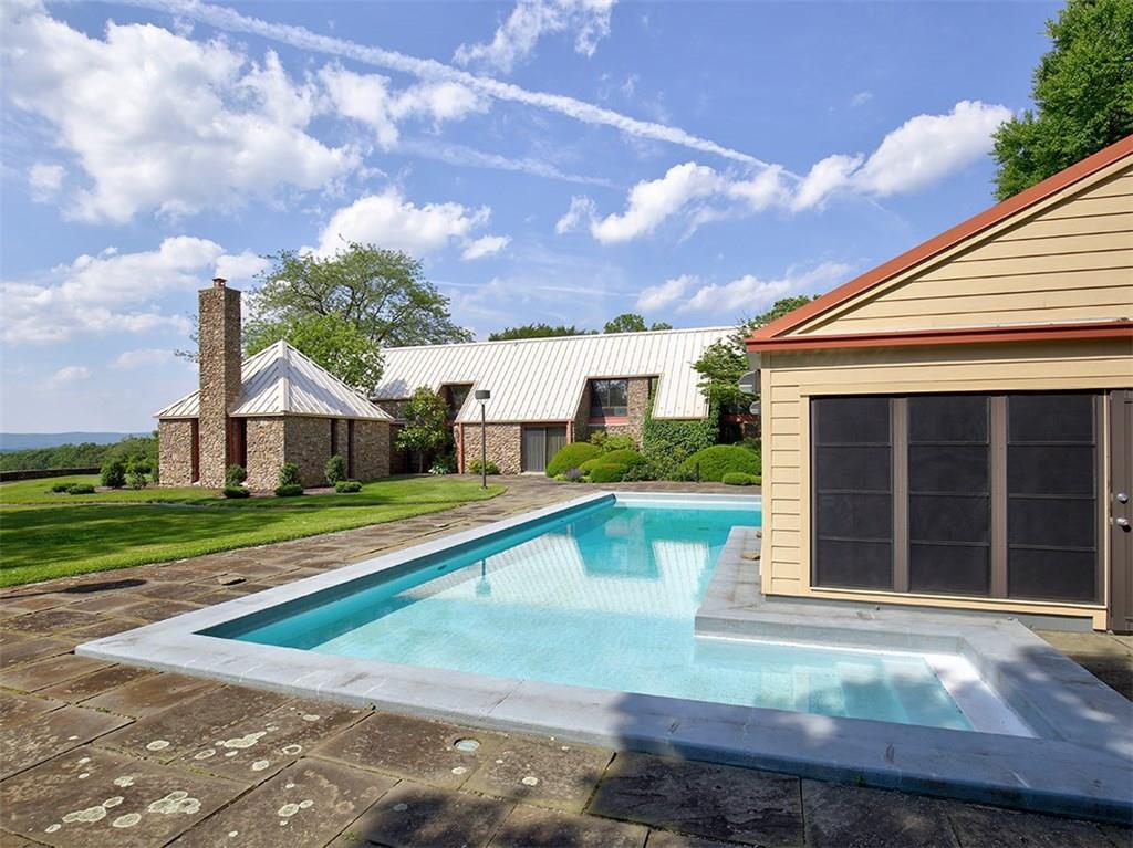 305 Country Club Road Rector, PA 15677 - Photo 22 of 25 This is a real concrete pool with pool house for those seeking shade, dressing rooms and bath.