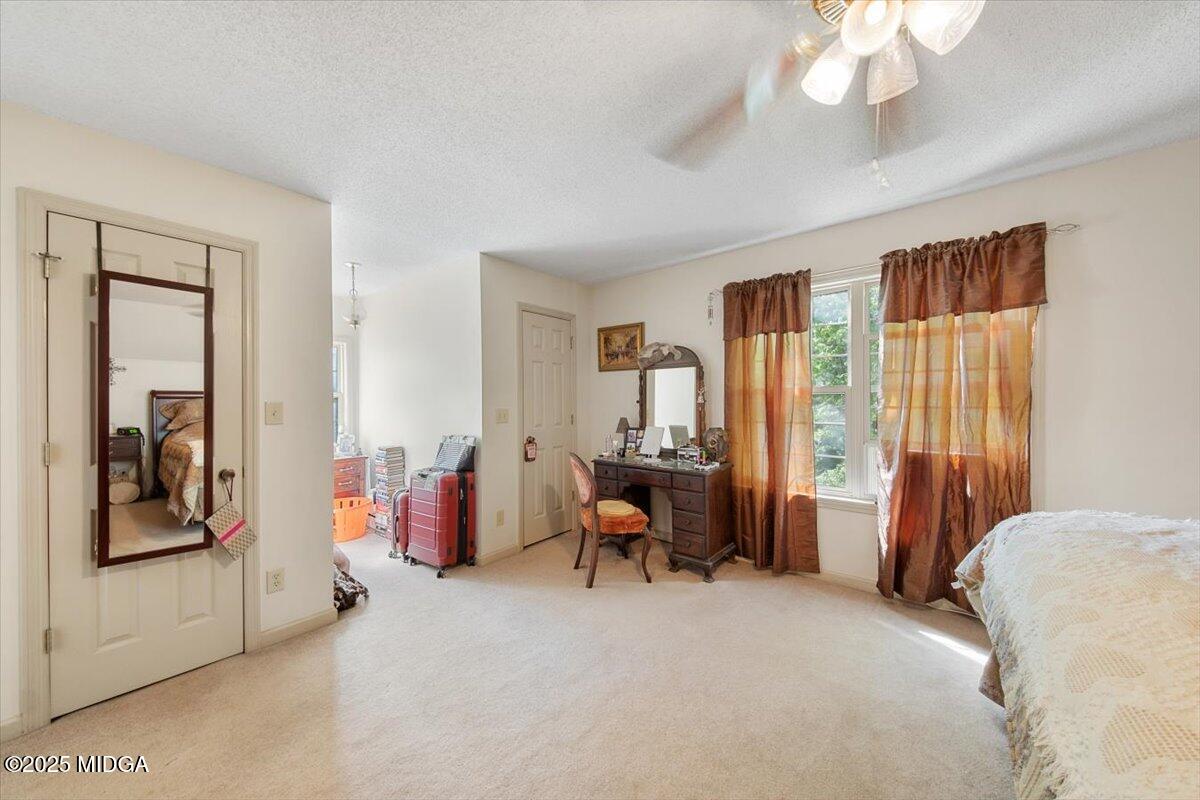 856 Lite-N-Tie Road Macon, GA 31211 - Photo 14 of 45 a living room with furniture and a large window
