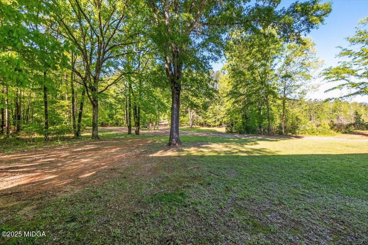 856 Lite-N-Tie Road Macon, GA 31211 - Photo 30 of 45 a view of a house with a big yard