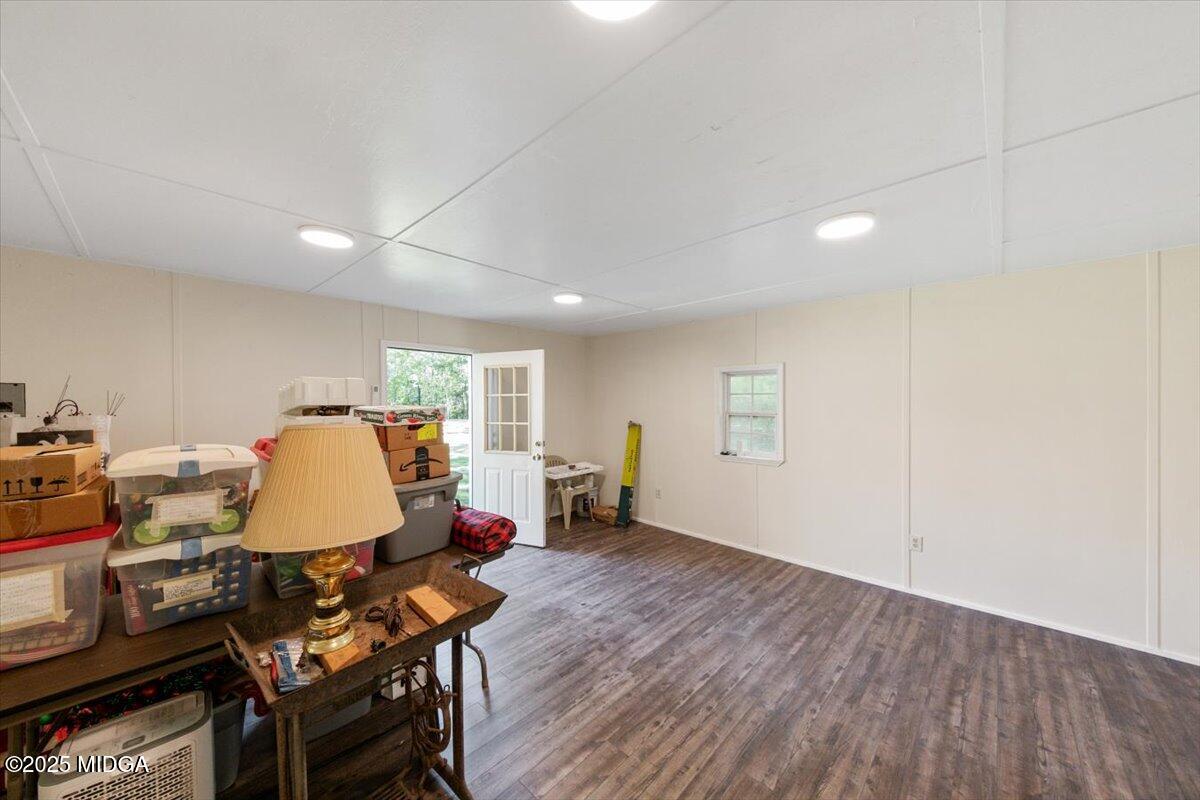 856 Lite-N-Tie Road Macon, GA 31211 - Photo 40 of 45 a living room with furniture and a wooden floor