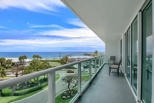 a view of a balcony with an outdoor space