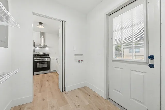 a view of an empty room and window