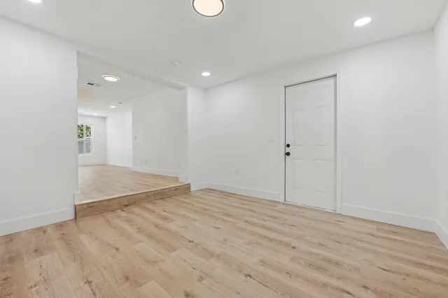 a bathroom with a double vanity sink mirror and
