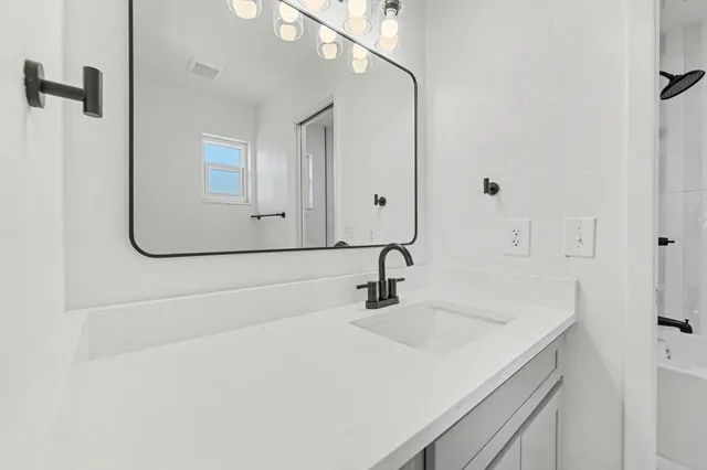 a view of empty room with floor to ceiling window