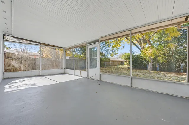 a kitchen with table and chair