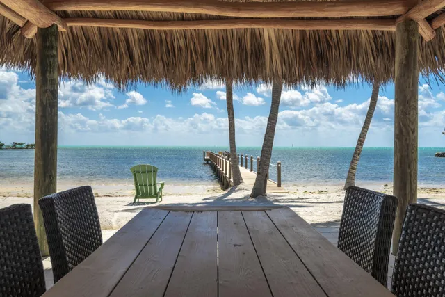 a view of outdoor space with seating area and barbeque oven