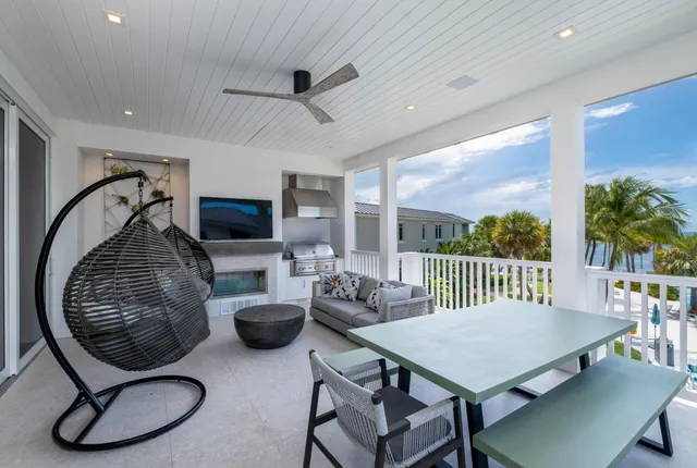 a view of a garden with sitting area