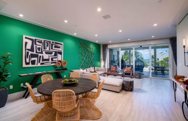 a bedroom with a large bed and a flat screen tv