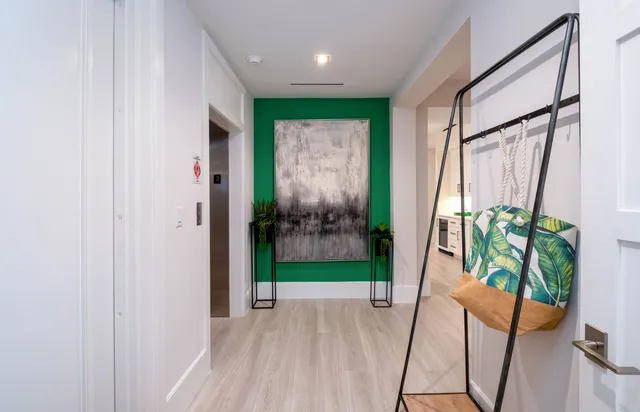 a house with swimming pool in front of it