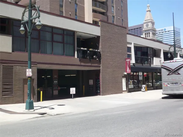 a view of a building with a street