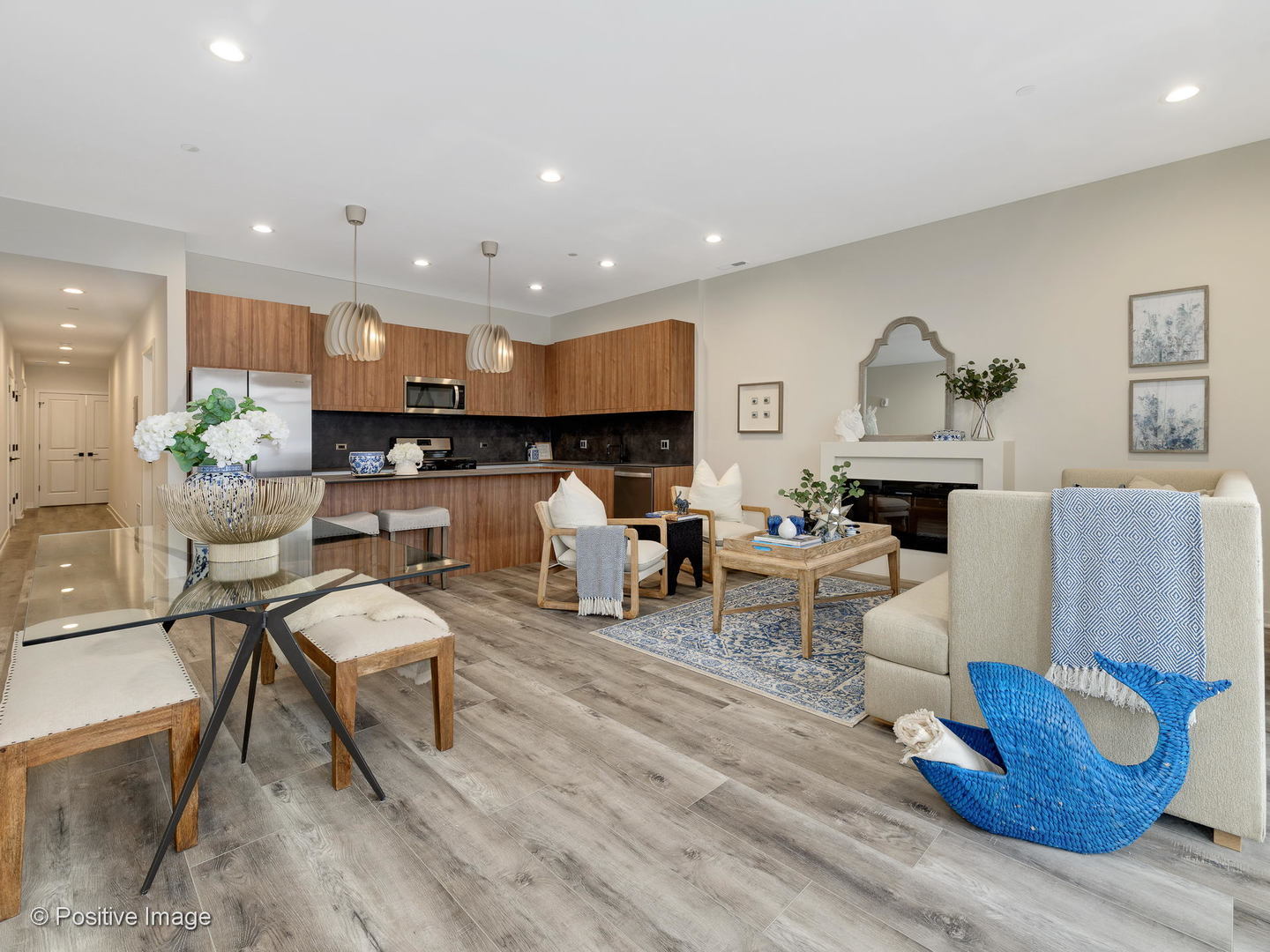 770 East Irving Park Road, Unit 3E Roselle, IL 60172 - Photo 4 of 17 a living room with furniture and a wooden floor