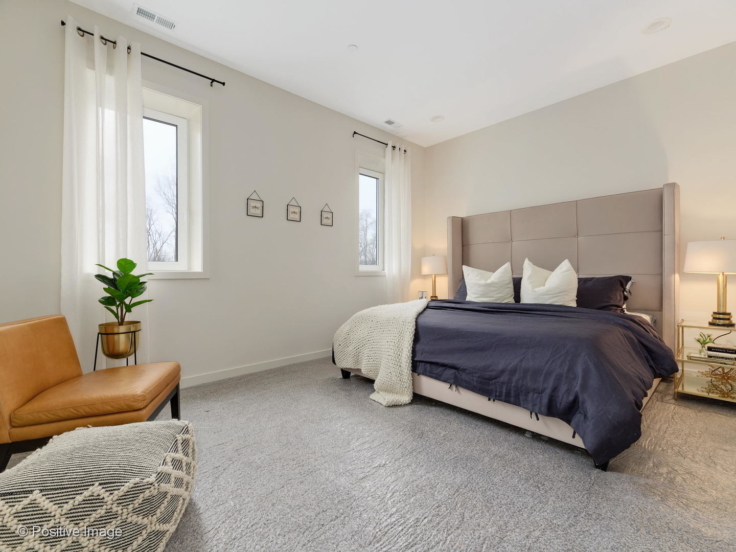 770 East Irving Park Road, Unit 3E Roselle, IL 60172 - Photo 9 of 17 a bedroom with a bed chair and a couch