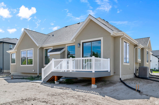 11749 South Halls Crk Road Draper, UT 84020 - Photo 5 of 21 Rear view of property with a wooden deck, stucco siding, and roof with shingles