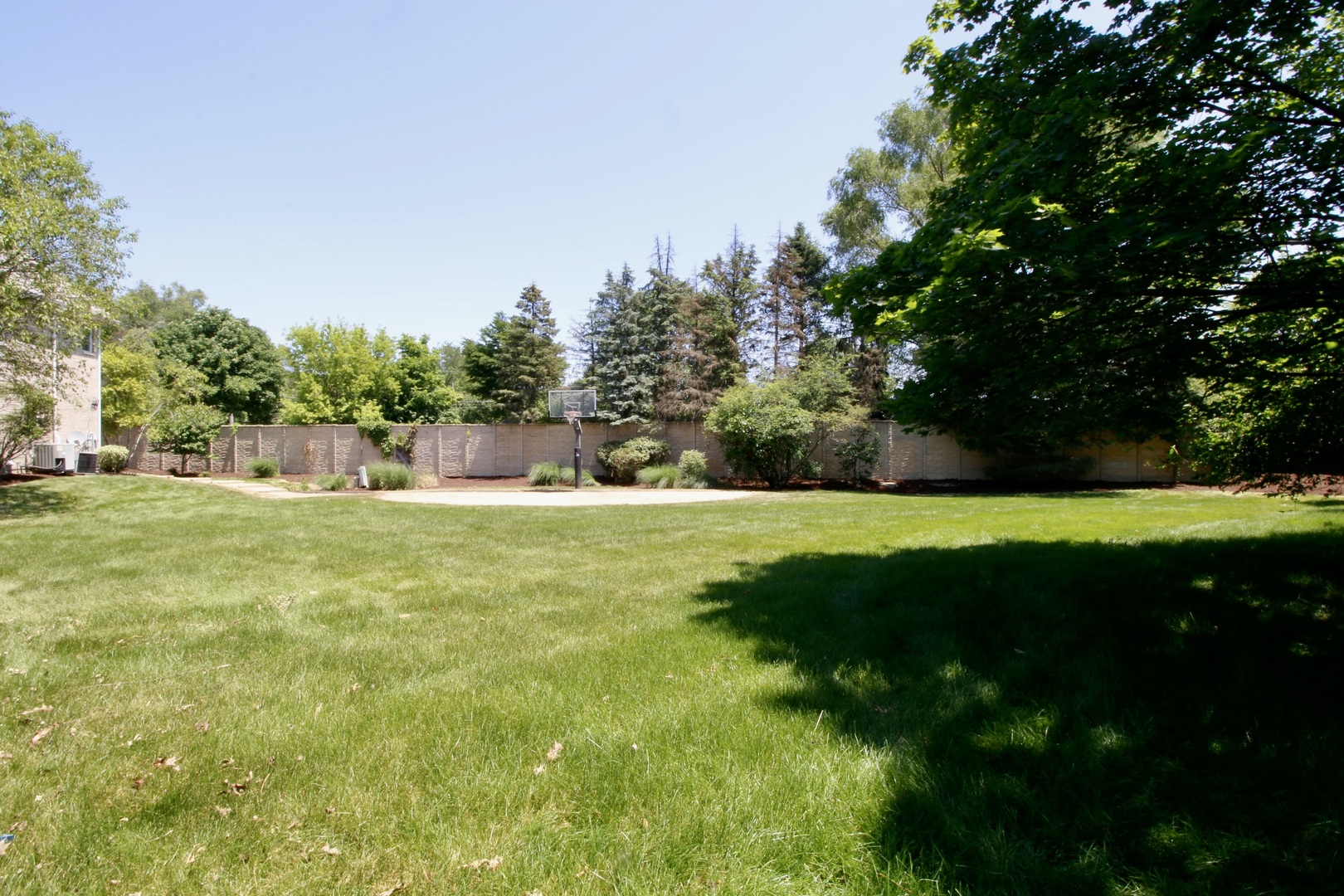 44 Oak Bluff Court Naperville, IL 60565 - Photo 6 of 6 a view of yard with swimming pool and green space