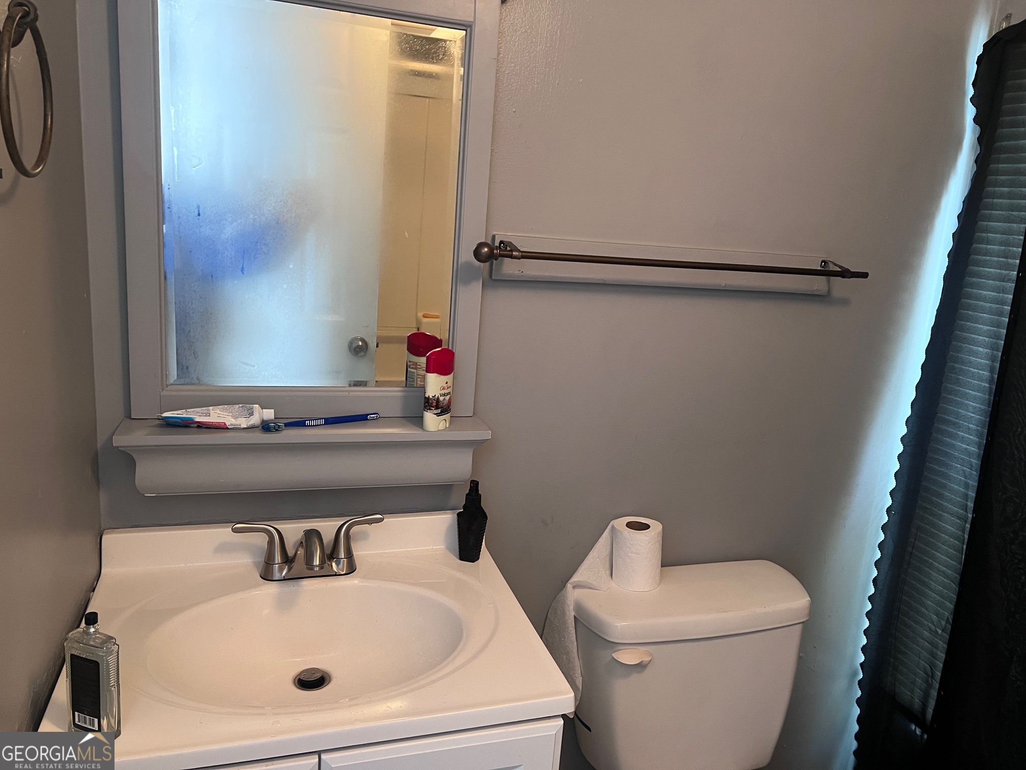 710 Magnolia Drive Macon, GA 31217 - Photo 11 of 13 a bathroom with a sink toilet and shower