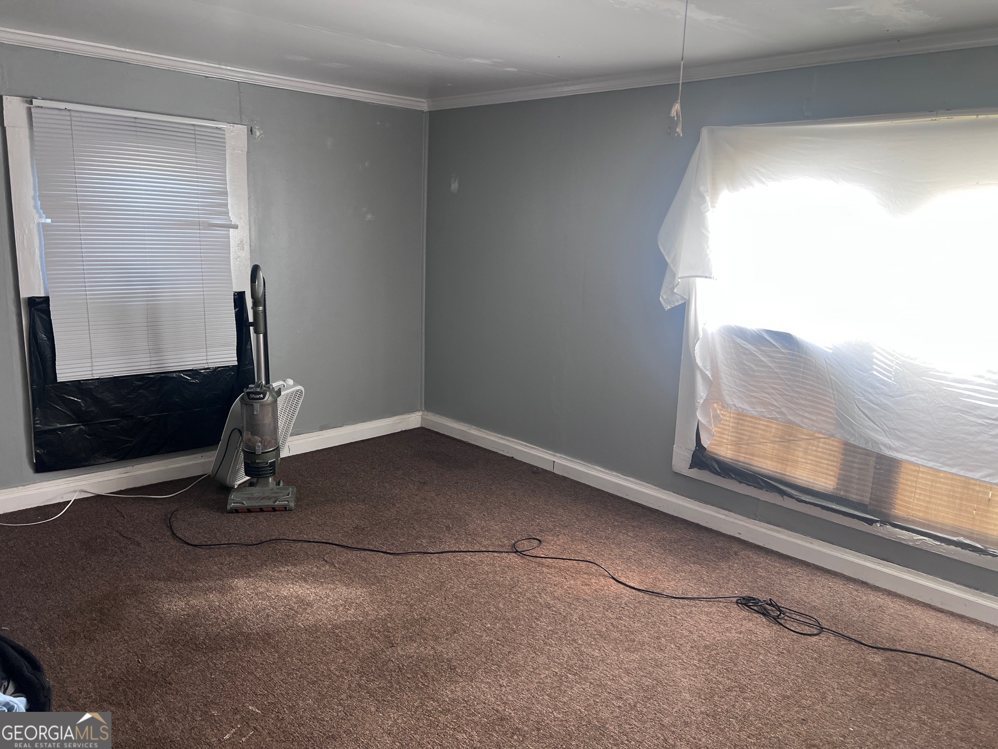 710 Magnolia Drive Macon, GA 31217 - Photo 8 of 13 a view of empty room with wooden floor
