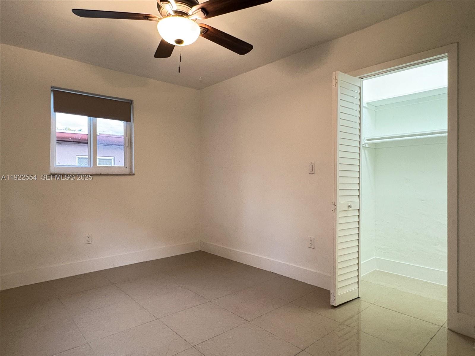 527 Southwest 9th Avenue, Unit 527 Miami, FL 33130 - Photo 26 of 34 a view of an empty room with a window