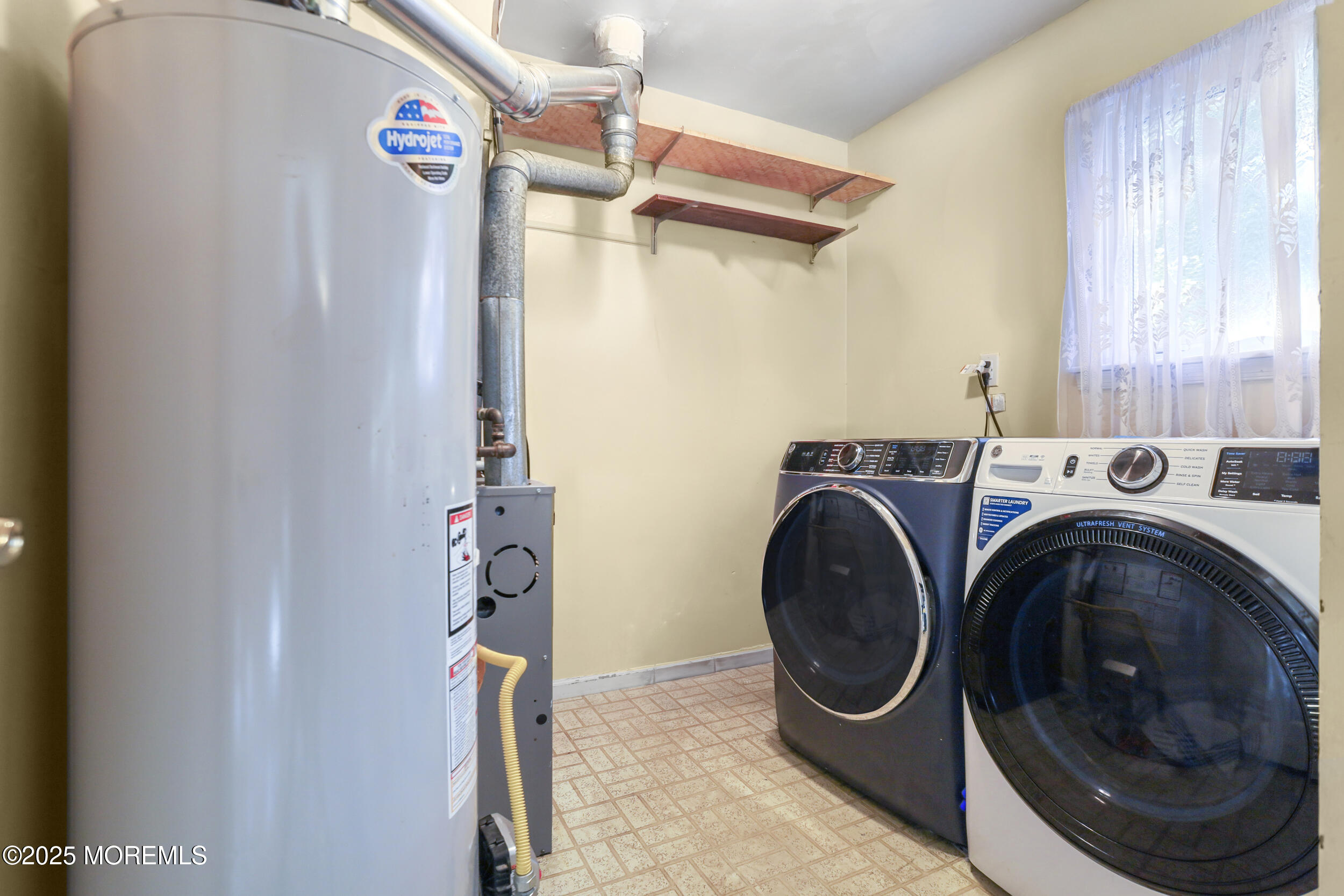 35 Winsted Drive Howell, NJ 07731 - Photo 11 of 22 a utility room with dryer and washer