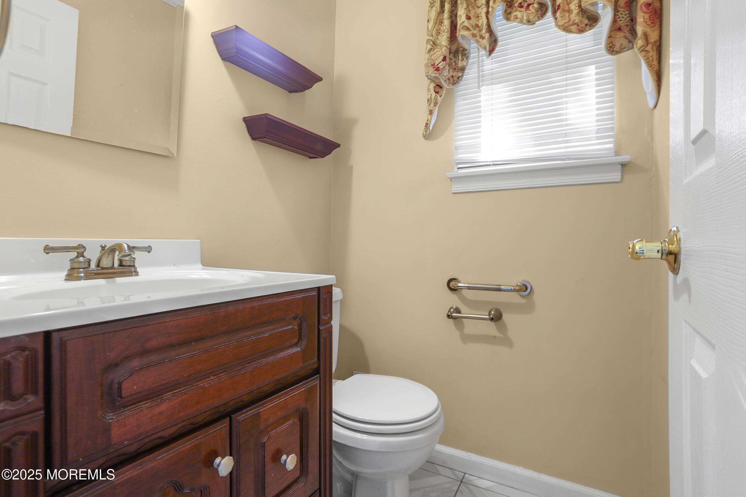 35 Winsted Drive Howell, NJ 07731 - Photo 12 of 22 a bathroom with a sink mirror vanity and toilet