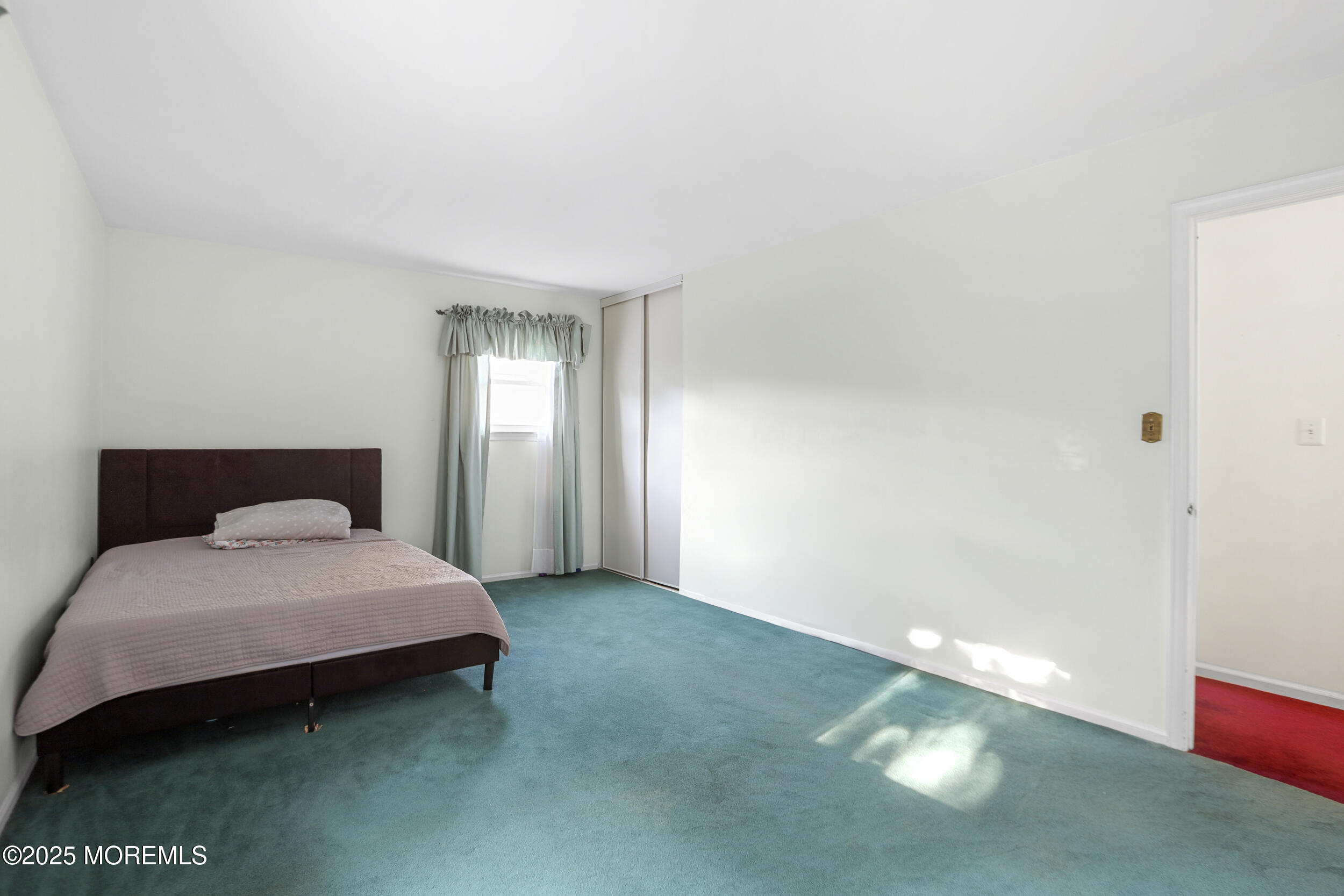 35 Winsted Drive Howell, NJ 07731 - Photo 13 of 22 a spacious bedroom with a bed and window
