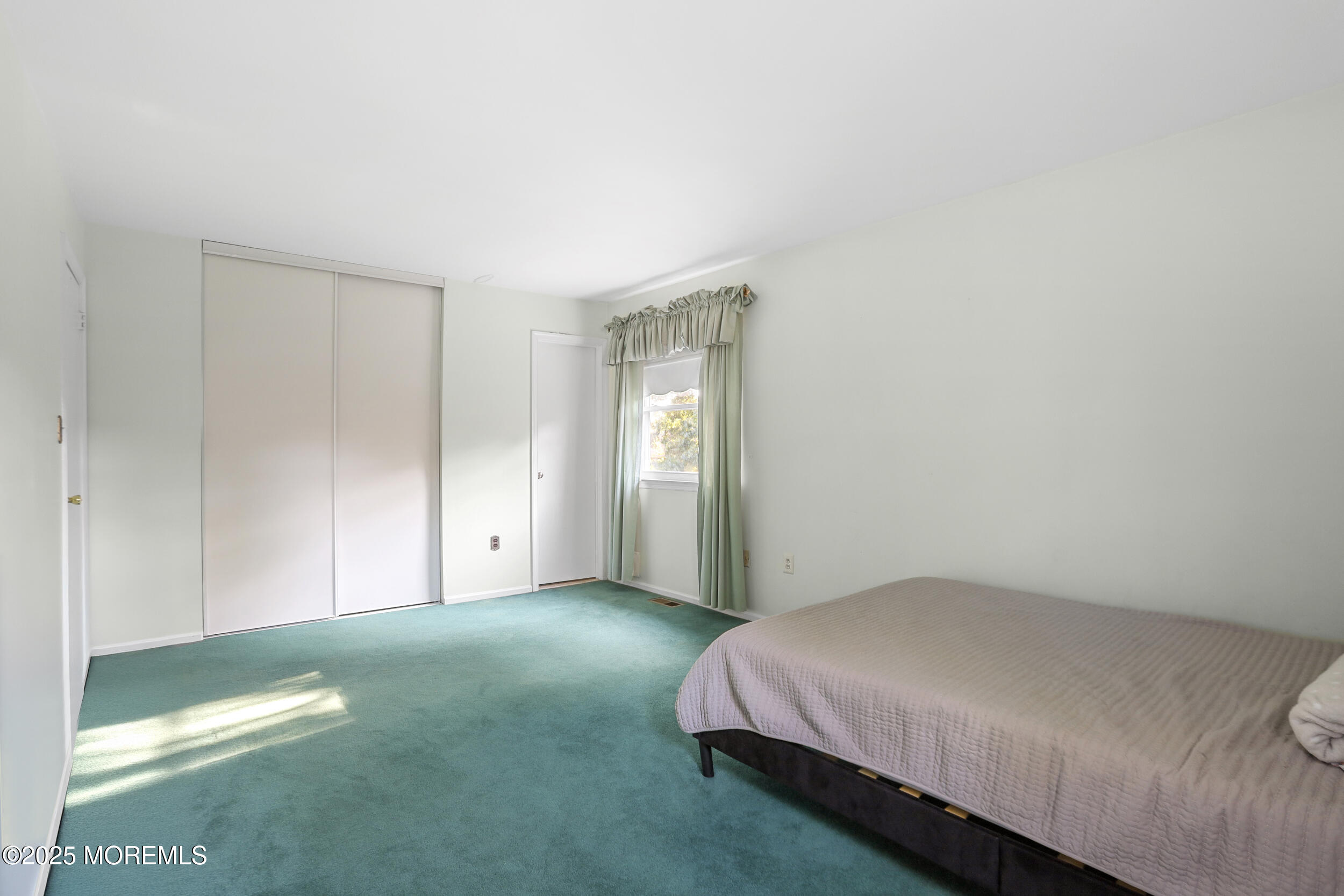 35 Winsted Drive Howell, NJ 07731 - Photo 14 of 22 a bedroom with a bed and a window