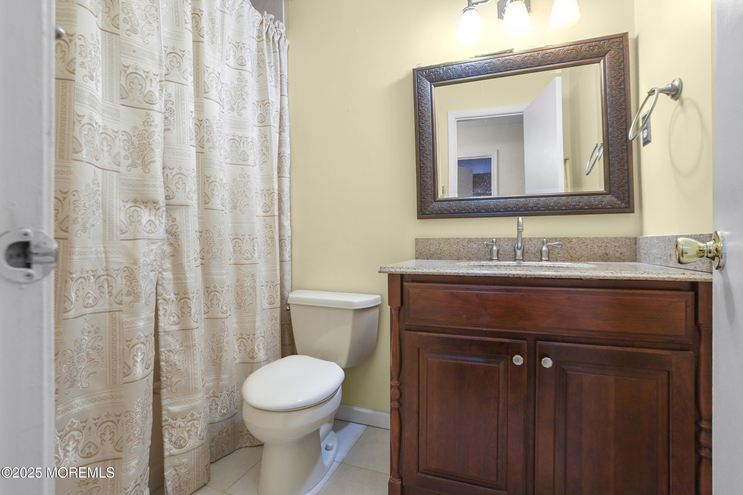 35 Winsted Drive Howell, NJ 07731 - Photo 18 of 22 a bathroom with a sink a toilet and a mirror