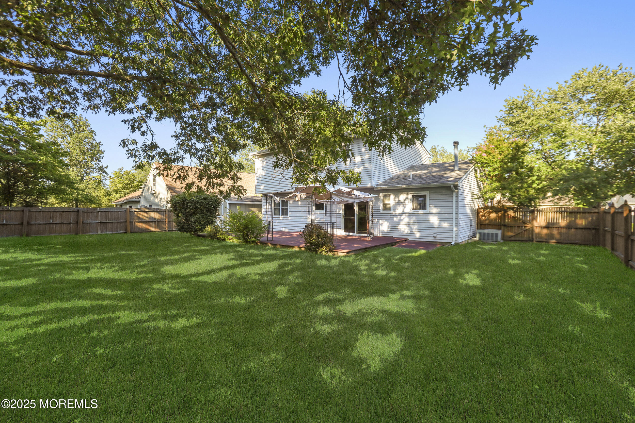 35 Winsted Drive Howell, NJ 07731 - Photo 20 of 22 a view of a house with a backyard