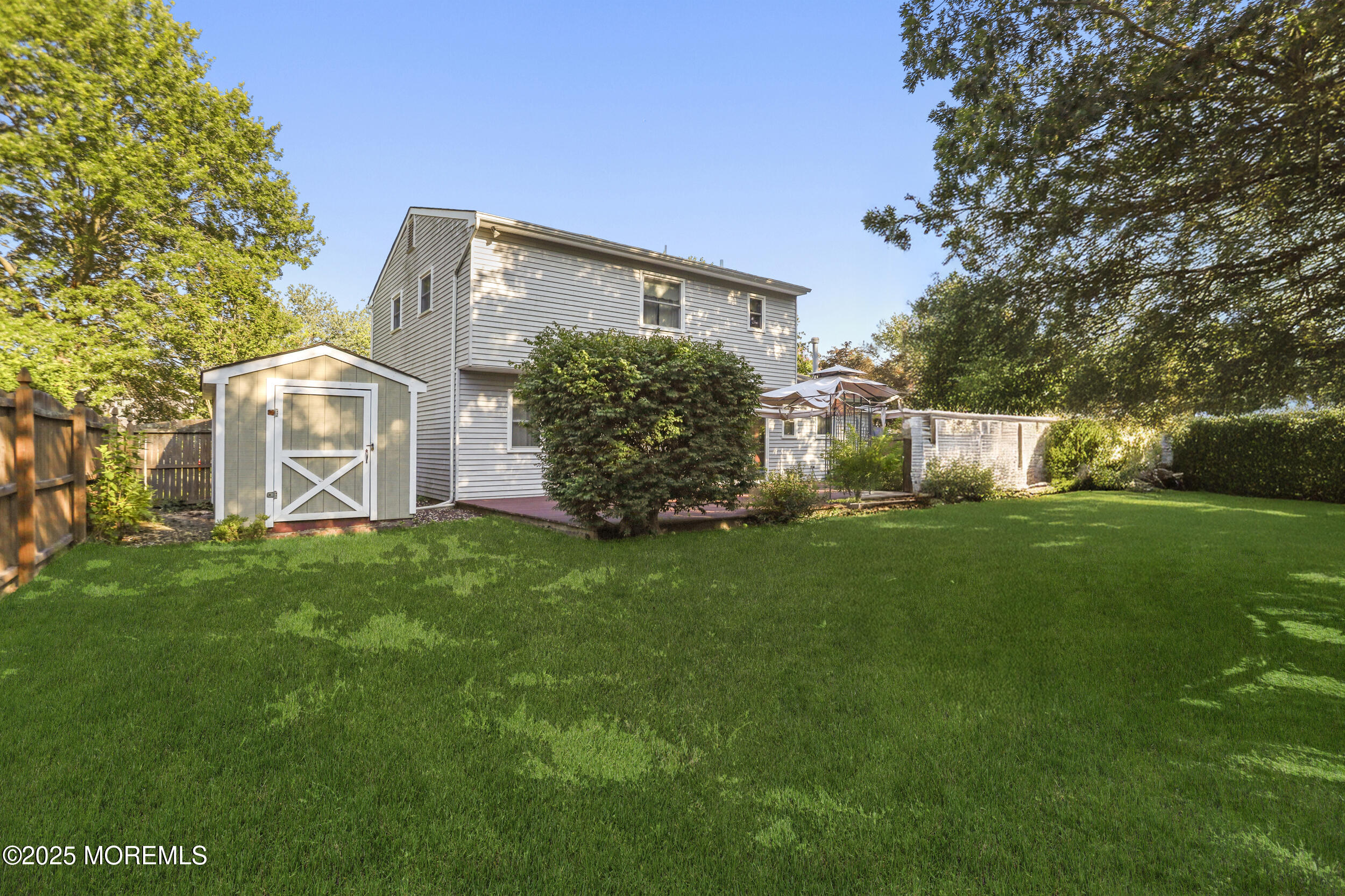35 Winsted Drive Howell, NJ 07731 - Photo 21 of 22 a front view of a house with garden