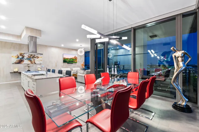 a kitchen with stainless steel appliances and a stove top oven