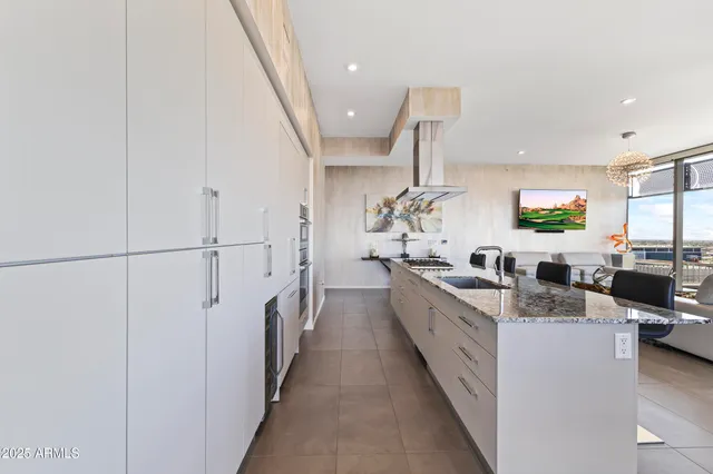 a bathroom with a toilet and a shower curtain