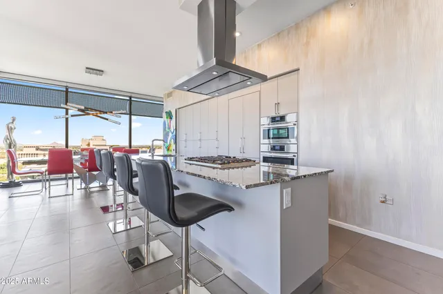 a large bathroom with a double vanity sink and mirror