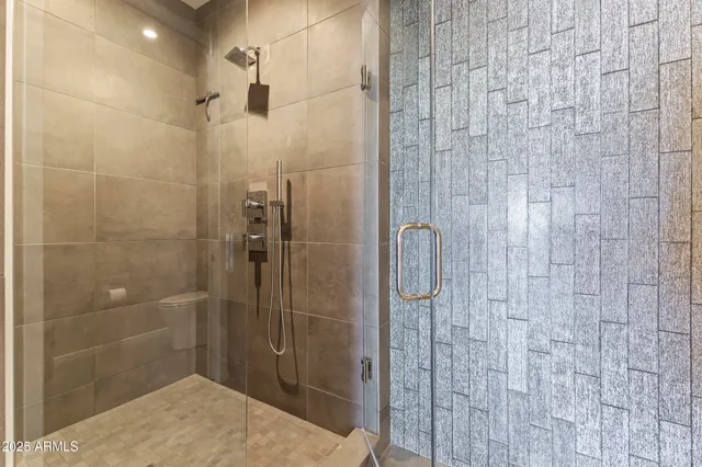a kitchen with stainless steel appliances cabinets and a table