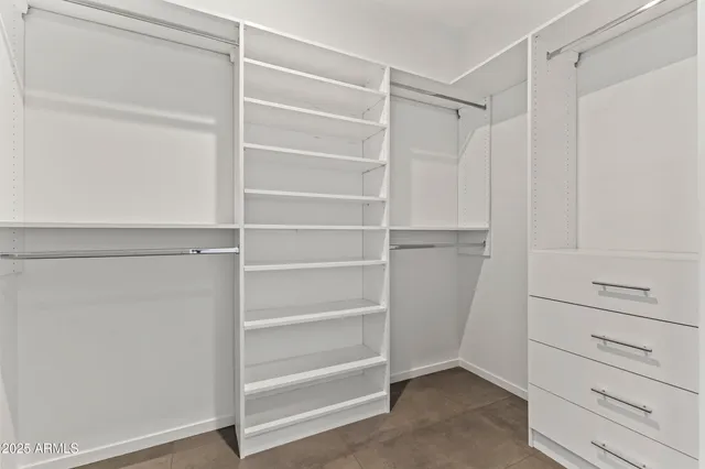 a view of a terrace with seating area and lake view