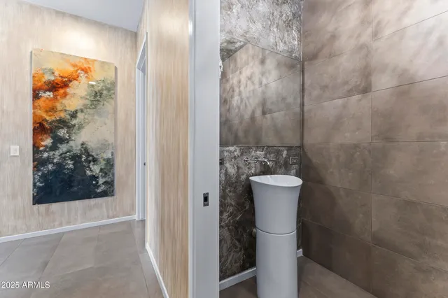 a view of a swimming pool with a lounge chairs