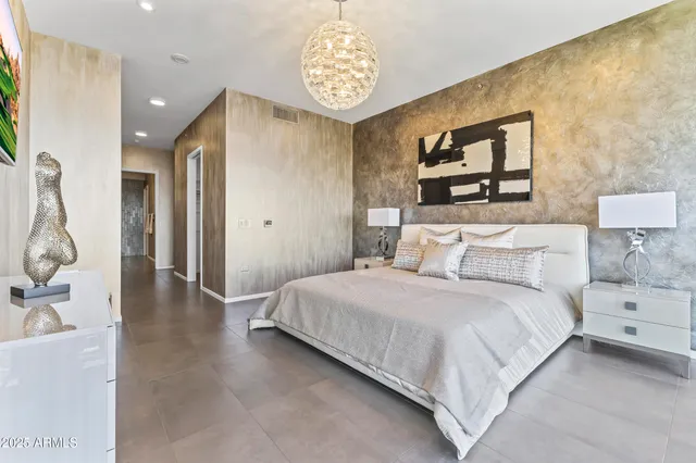 a living room with furniture a pool table and a couch
