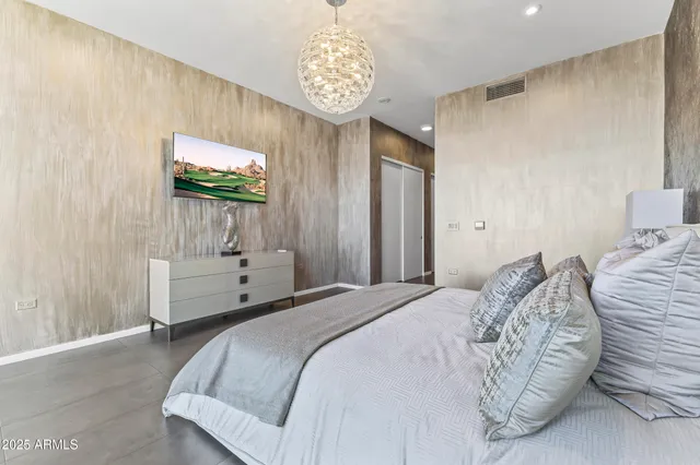 a view of a yard with plants and trees