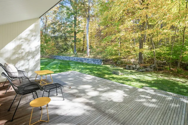 a picture of a room with a white wall and white walls