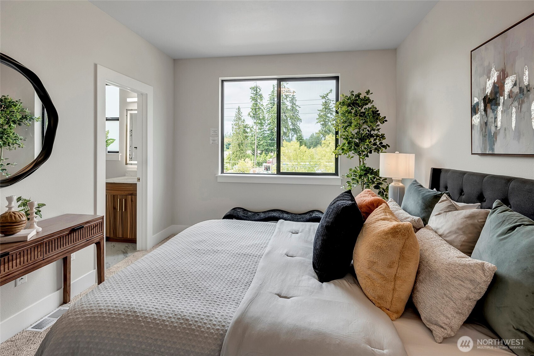 21402 39th Drive Southeast, Unit A Bothell, WA 98021 - Photo 15 of 31 a bed room with a bed and a window