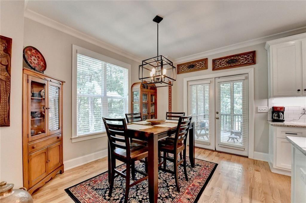 919 Fields Chapel Road Canton, GA 30114 - Photo 20 of 58 a view of a dining room with furniture window and wooden floor